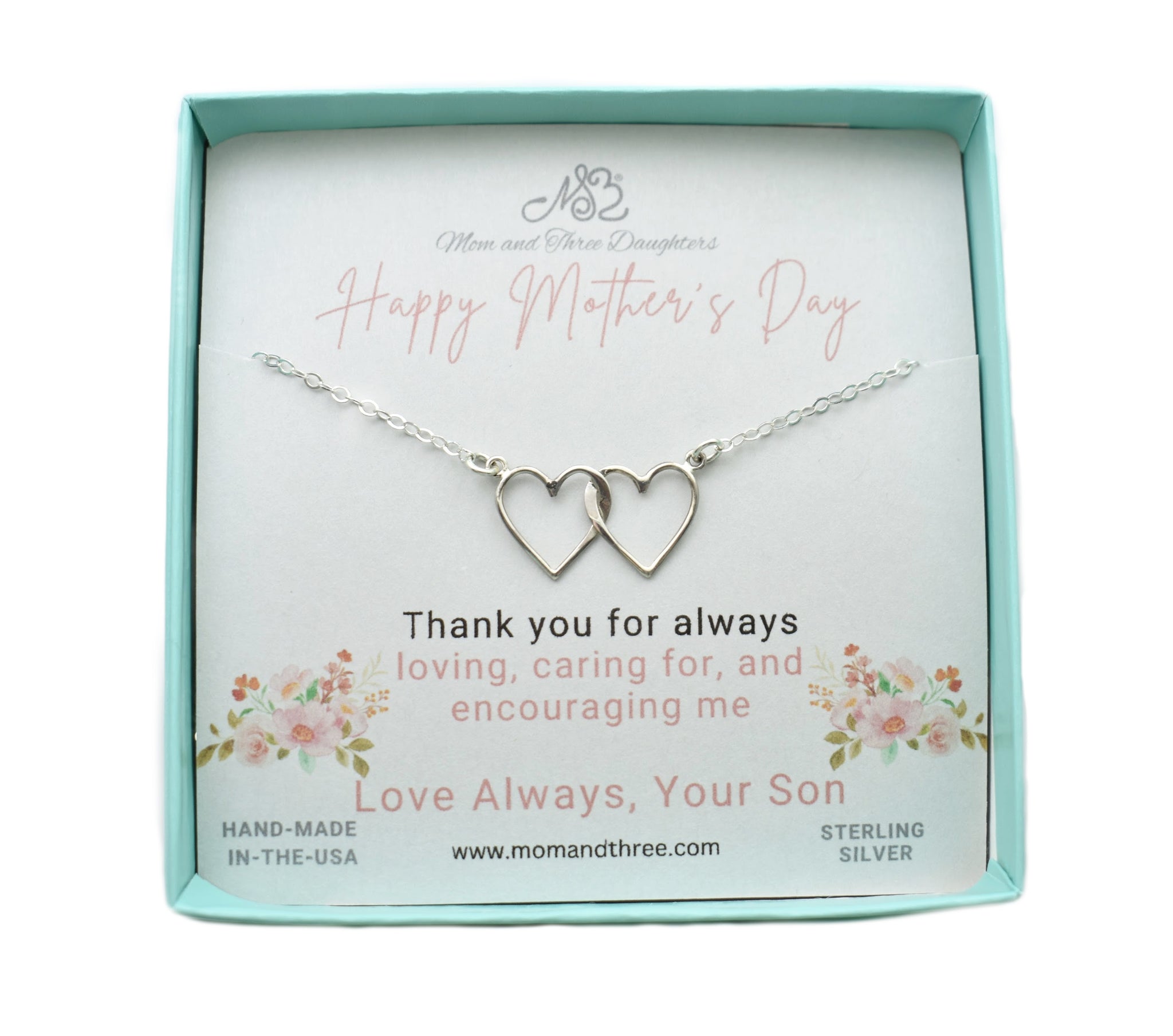 Two Interlocking Hearts in Sterling Silver Suspended on an 18 Inch Sterling Silver Split Chain.