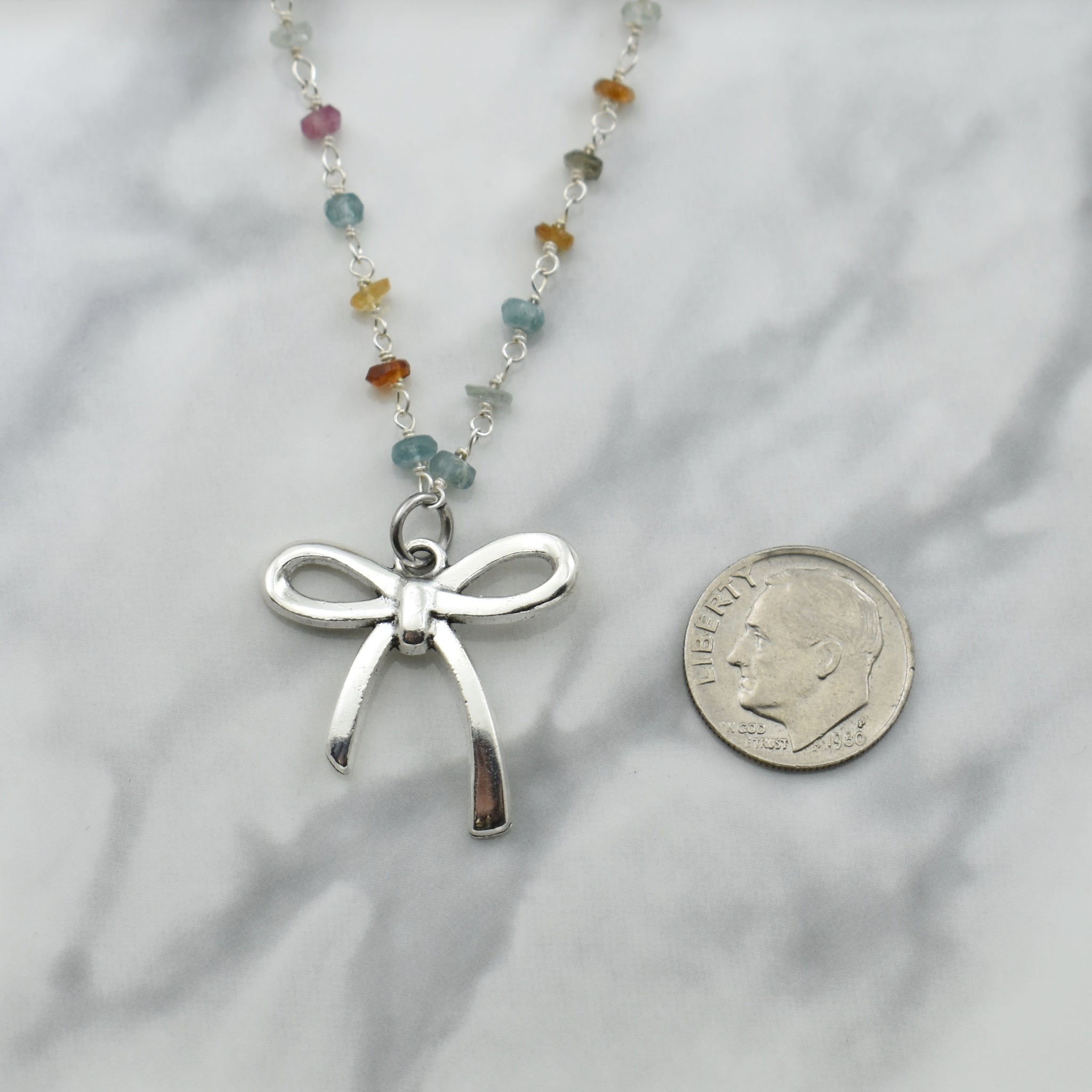 Antique Silver Plated Coquette Bow Necklace On A Multi Tourmaline Beaded Chain.