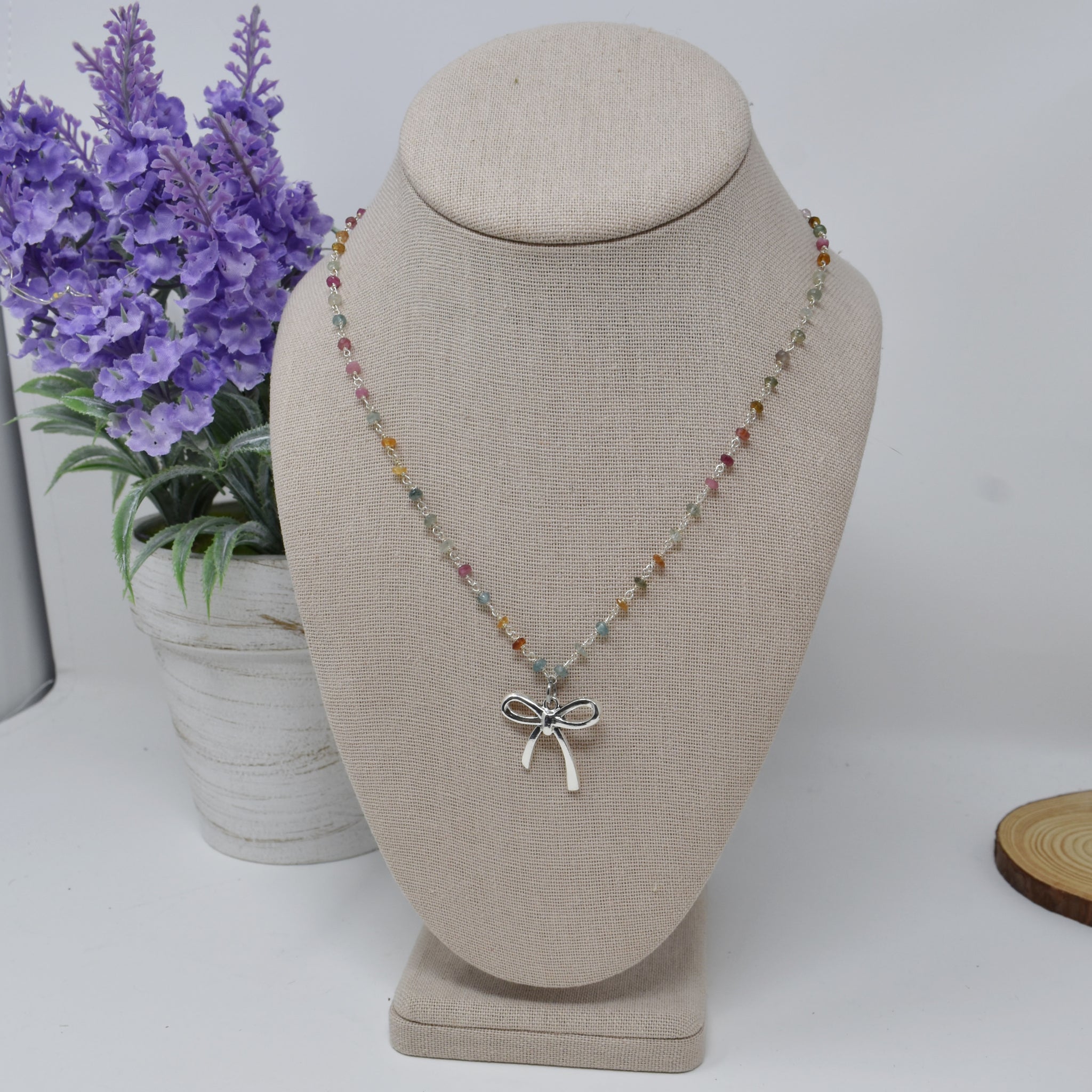 Antique Silver Plated Coquette Bow Necklace On A Multi Tourmaline Beaded Chain.