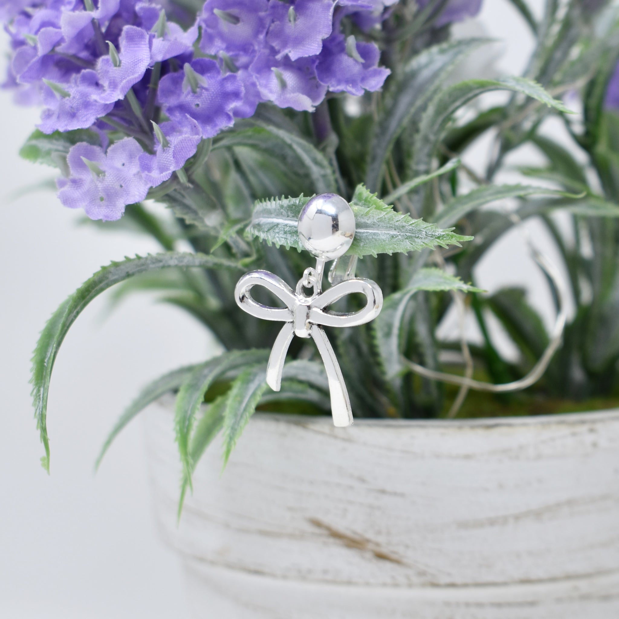 Silver Bow Clip On Earrings. Coquette Bow Jewelry.