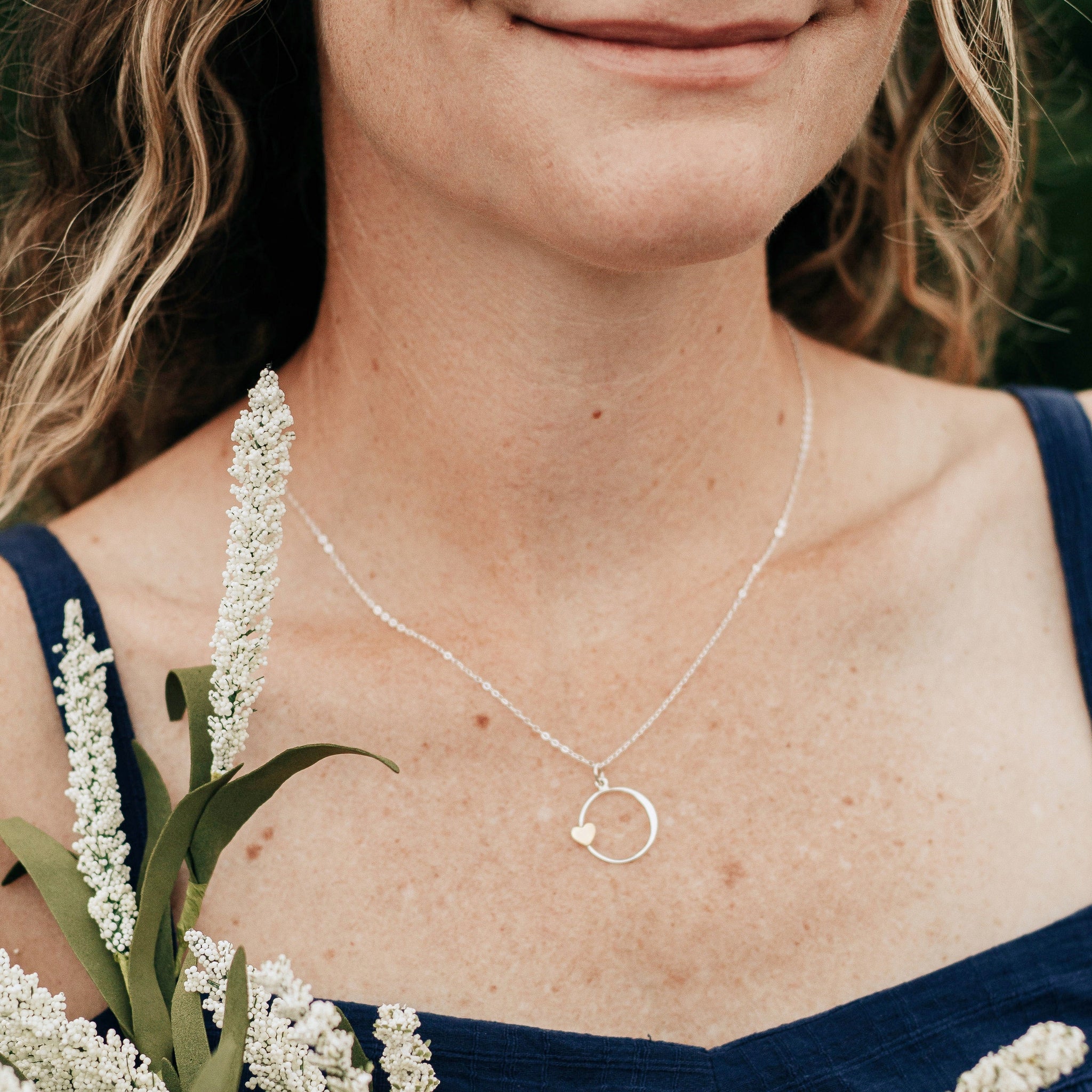 Sister Necklace. Sterling Silver Circle Charm with Bronze Heart Charm on a Sterling Silver Chain. Gift to Sister or Best Friend.