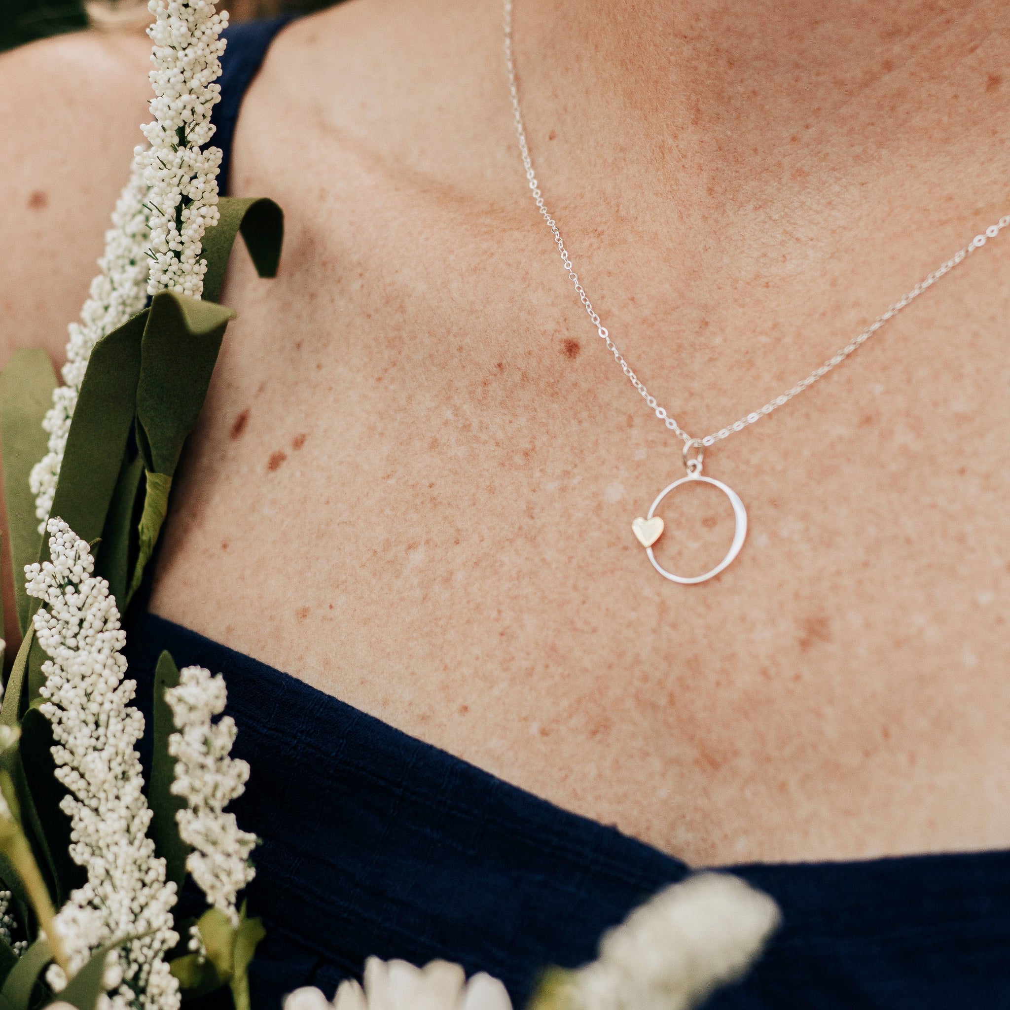 Sister Necklace. Sterling Silver Circle Charm with Bronze Heart Charm on a Sterling Silver Chain. Gift to Sister or Best Friend.
