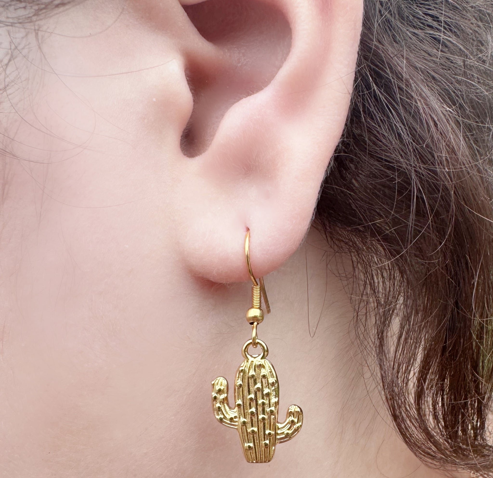 Gold Western Earring Sets in Gold Plated Zinc Alloy Metals. Cowboy Boot Earrings. Cactus and Bull Head Earrings. Enamel Sun Earrings.