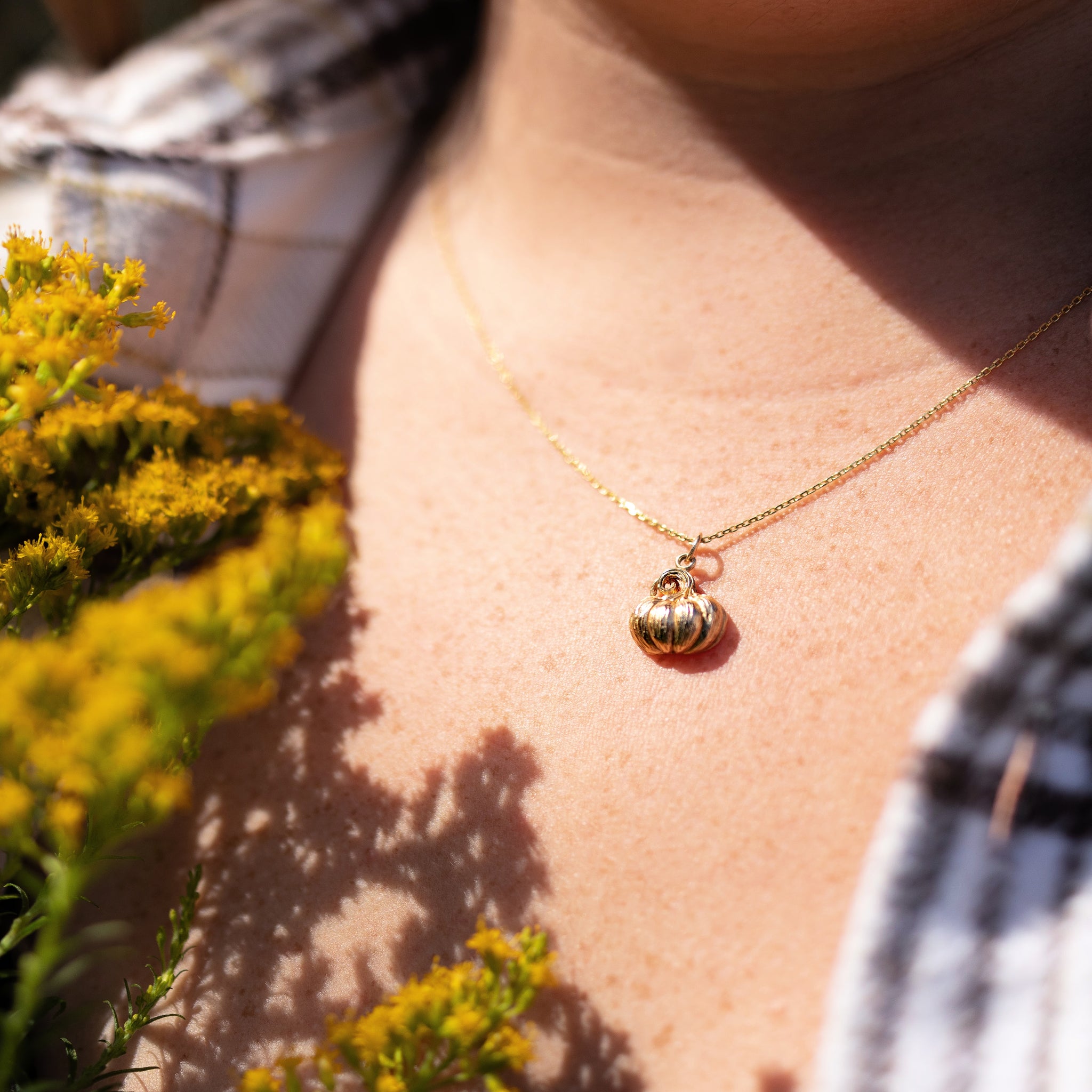 Bronze Dimensional Pumpkin Necklace on a Gold Filled Cable Chain.