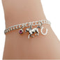 Horse Charm Bracelet in Sterling Silver and Accented by a Horseshoe and a Crystal Birthstone