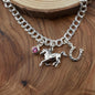 Horse Charm Bracelet in Sterling Silver and Accented by a Horseshoe and a Crystal Birthstone