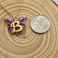 Butterfly Necklace in Gold Toned Mixed Metal and Enamel