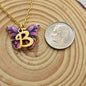 Butterfly Necklace in Gold Toned Mixed Metal and Enamel