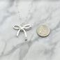 Antique Plated Coquette Bow Necklace On A Sterling Silver Saturn Chain. Bow Jewelry. Ribbon Jewelry. Coquette Jewelry.