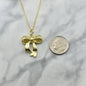 Gold Zinc Alloy Coquette Bow Necklace on a Yellow Gold Plated Sterling Silver Cable Chain. Bow Jewelry. Ribbon Jewelry. Coquette Jewelry.