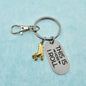 Roller Skating Keychain in Gold Plated Pewter and Stainless Steel