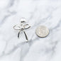 Silver Bow Clip On Earrings. Coquette Bow Jewelry.